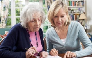 Mother and daughter discuss home healthcare solutions