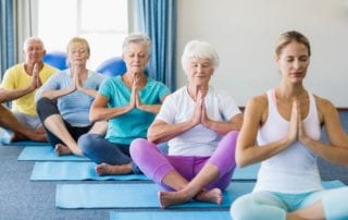 seniors doing yoga