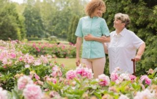 Senior and young woman in a garden