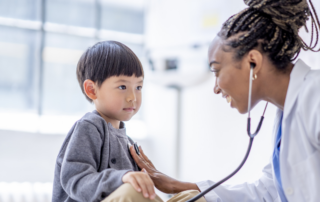 Doctor treating child